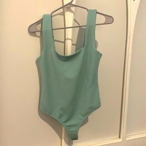 Pink lily bodysuit never worn